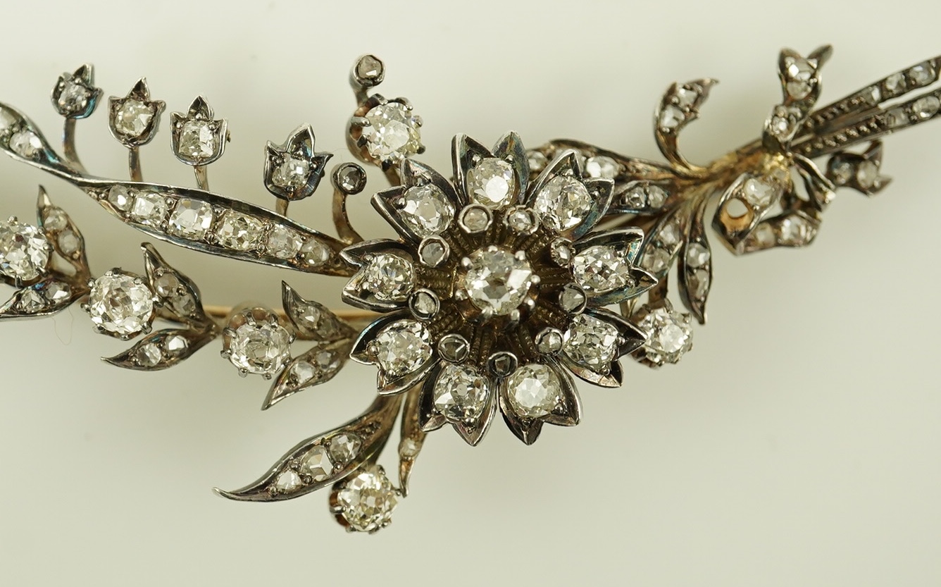 A Victorian gold, silver and diamond cluster foliate spray brooch